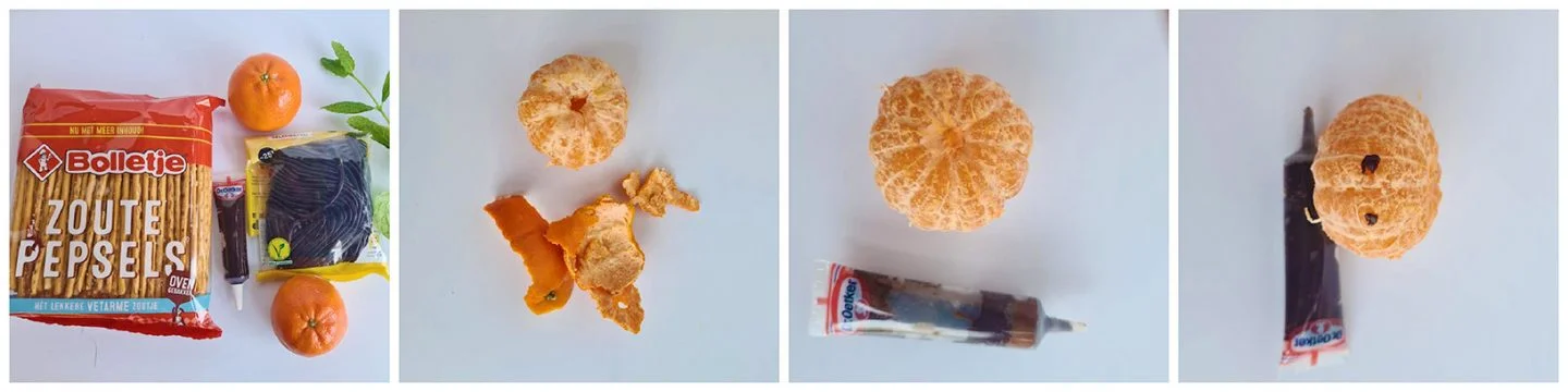 Maak een gezicht op de mandarijn